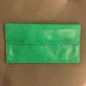 Green leather clutch